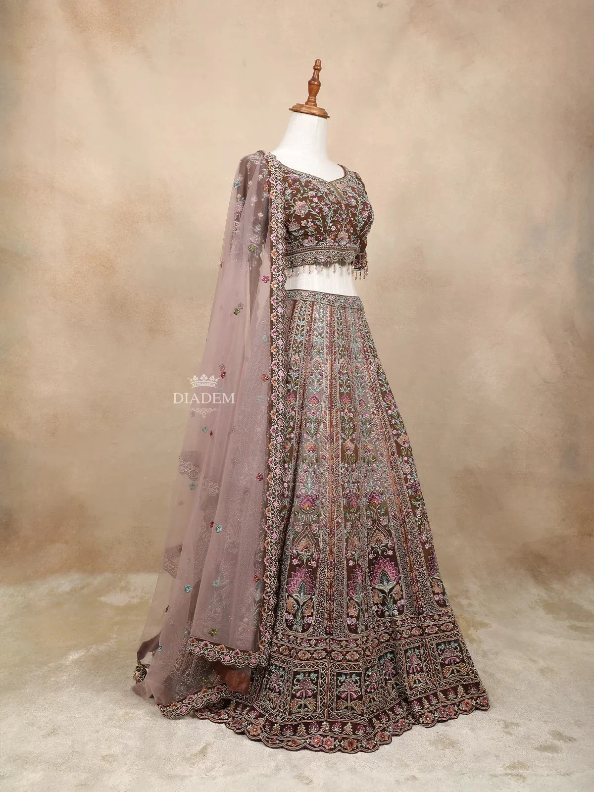 Brown Georgette Lehenga Embellished with Stones and Threadwork Embroidery Paired with Dupatta